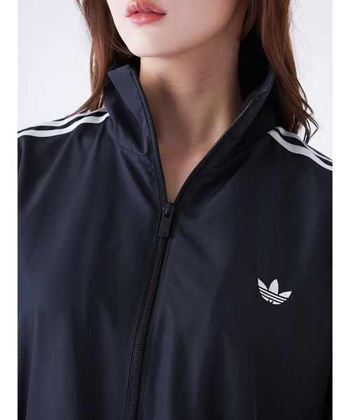 adidas(アディダス)の「【adidas Originals】FIRE BIRD ADILENIUM TT/ファイヤーバードアディレニウムトラックジャケット(ブルゾン・レディース・ブラック・XS)」の9枚目の写真
