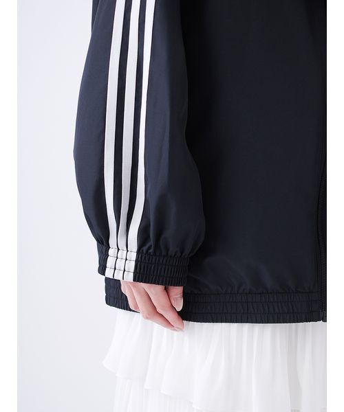 adidas(アディダス)の「【adidas Originals】FIRE BIRD ADILENIUM TT/ファイヤーバードアディレニウムトラックジャケット(ブルゾン・レディース・ブラック・XS)」の12枚目の写真