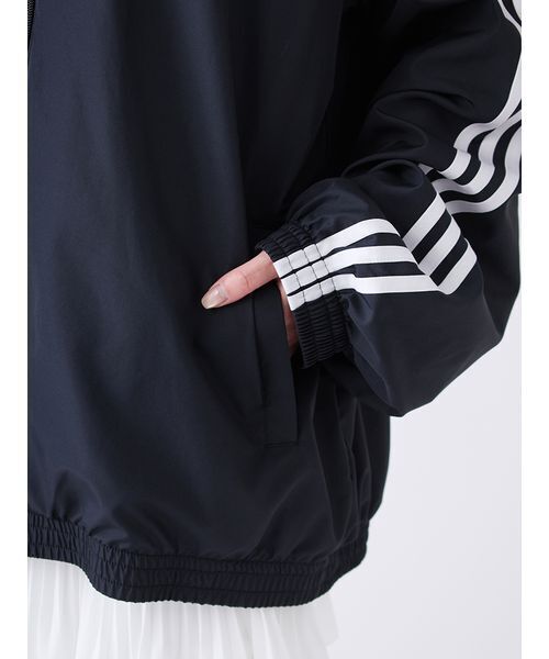adidas(アディダス)の「【adidas Originals】FIRE BIRD ADILENIUM TT/ファイヤーバードアディレニウムトラックジャケット(ブルゾン・レディース・ブラック・XS)」の13枚目の写真