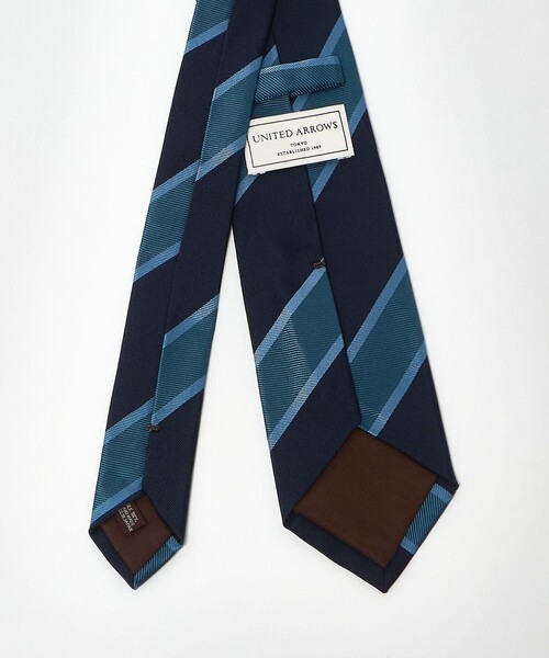 UNITED ARROWS（ユナイテッドアローズ）の「2トーン レジメンタル ネクタイ（ネクタイ・メンズ・ダークブラウン/ブラウン系/ネイビー・FREE）」の5枚目の写真