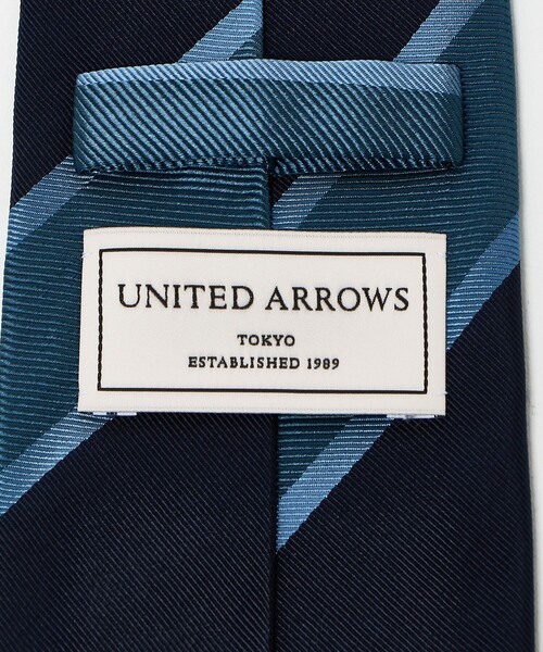 UNITED ARROWS（ユナイテッドアローズ）の「2トーン レジメンタル ネクタイ（ネクタイ・メンズ・ダークブラウン/ブラウン系/ネイビー・FREE）」の11枚目の写真