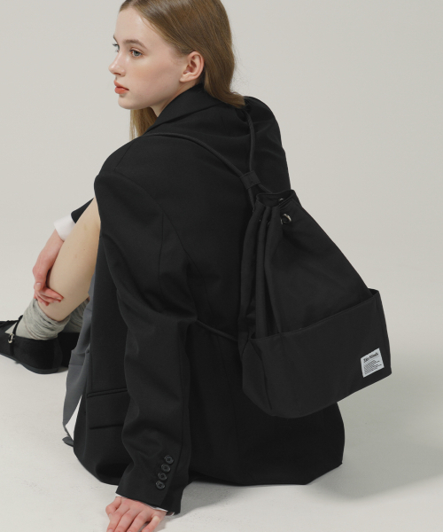 TRM(スリーマインズ)の「TRM リサイクルナイロン ラッキードロウバックパック T53G(バックパック/リュック・レディース・ブラック・FREE)」の5枚目の写真