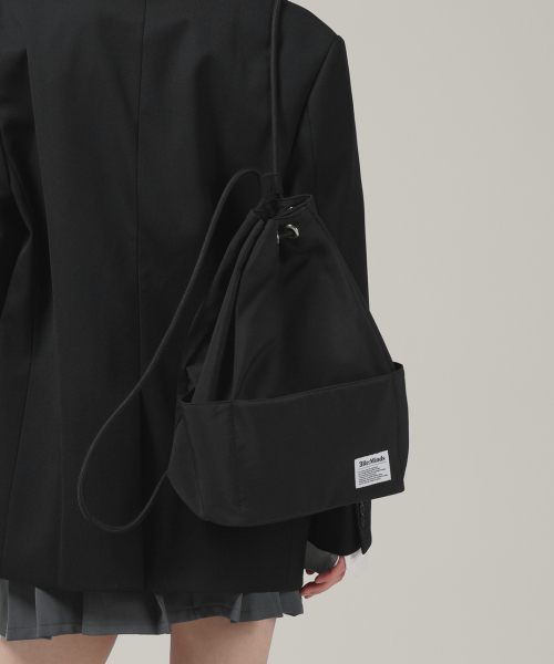 TRM(スリーマインズ)の「TRM リサイクルナイロン ラッキードロウバックパック T53G(バックパック/リュック・レディース・ブラック・FREE)」の6枚目の写真