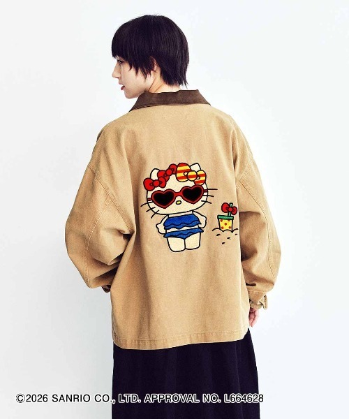 MEDE19F(メデジュウキュウ)の「MEDE19F HELLO KITTY 刺しゅうモチーフのワークジャケット〈トコナツバケーションデザイン〉(カバーオール・レディース・ブラウン系その他・LL/L/M)」の1枚目の写真
