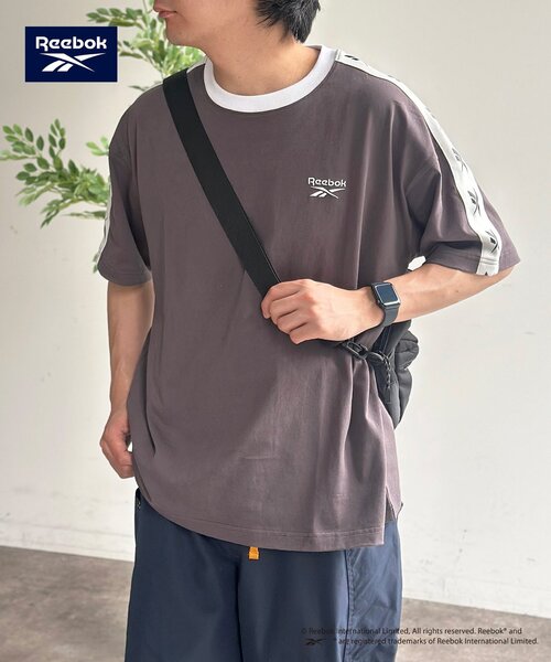 Reebok(リーボック)の「【Reebok】肩ラインT(Tシャツ/カットソー・レディース・サックスブルー/チャコールグレー/ホワイト・MEDIUM/LARGE)」の1枚目の写真