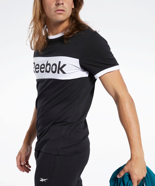 Reebok(リーボック)の「トレーニング エッセンシャルズ リニア ロゴ Tシャツ / Training Essentials Linear Logo Tee(Tシャツ/カットソー・メンズ・ターコイズブルー/ホワイト/ブラック/レッド/ネイビー・XX-LARGE/X-LARGE/MEDIUM/LARGE/SMALL/XXXX-LARGE/XXX-LARGE/X-SMALL)」の6枚目の写真