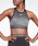 Reebok�i���[�{�b�N�j�́u���i�C�e�b�h �o�C �t�B�b�g�l�X �V�[�����X �N���b�v�g�b�v  / United By Fitness Seamless Crop Top�iT�V���c/�J�b�g�\�[�j�v�b�u���b�N×�O���[