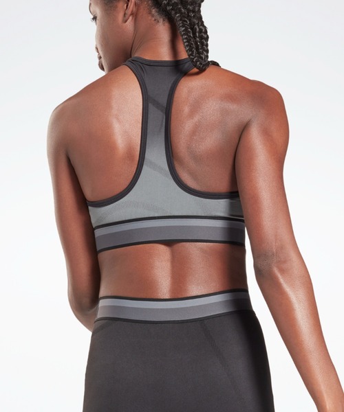 Reebok(リーボック)の「ユナイテッド バイ フィットネス シームレス クロップトップ / United By Fitness Seamless Crop Top(Tシャツ/カットソー・レディース・ブラック×グレー/マルーン・X-SMALL/X-LARGE/MEDIUM)」の5枚目の写真
