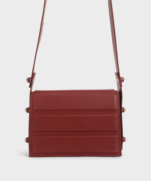 CHARLES & KEITH(チャールズ & キース)の「アイレットエンベリッシュド トップハンドルバッグ / Eyelet-Embellished Top Handle Bag(ハンドバッグ・レディース・ホワイト/ブラック/レッド/ダークブルー・S)」の4枚目の写真