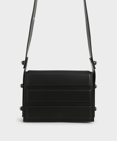 CHARLES & KEITH(チャールズ & キース)の「アイレットエンベリッシュド トップハンドルバッグ / Eyelet-Embellished Top Handle Bag(ハンドバッグ・レディース・ホワイト/ブラック/レッド/ダークブルー・S)」の1枚目の写真