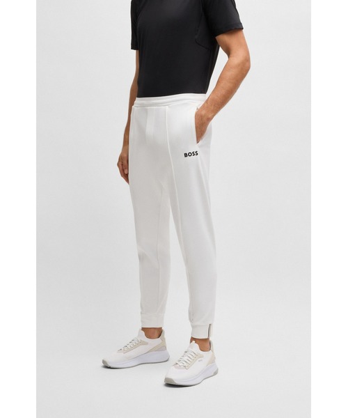 BOSS(ボス)の「レギュラーフィットパンツ ストレッチギャバジン ロゴディテール(その他パンツ・メンズ・ホワイト・XXXL/XL/S/L/XXL)」の1枚目の写真