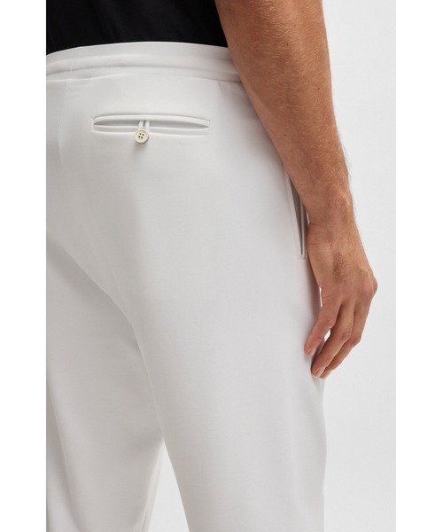 BOSS(ボス)の「レギュラーフィットパンツ ストレッチギャバジン ロゴディテール(その他パンツ・メンズ・ホワイト・XXXL/XL/S/L/XXL)」の2枚目の写真
