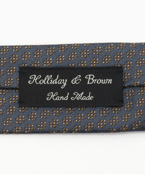 EDIFICE（エディフィス）の「Holliday & Brown(ホリデー & ブラウン) Small Oval Pattern Tie（ネクタイ・メンズ・グレー/ネイビー・FREE）」の5枚目の写真