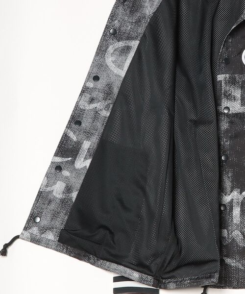 Champion(チャンピオン)の「【T18】【Champion/チャンピオン】 SATIN COACHES JACKET RIBBED CUFF PRINT(ミリタリージャケット・レディース・ブラック/ネイビー・SMALL/LARGE/MEDIUM)」の4枚目の写真