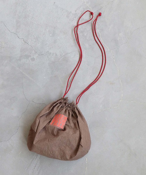 nitca（ニトカ）の「C/Lタイプライター巾着バック（エコバッグ/サブバッグ・レディース・ブラウン/オレンジ/ホワイト・FREE）」の2枚目の写真