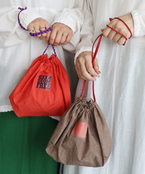 nitca（ニトカ）の「C/Lタイプライター巾着バック（エコバッグ/サブバッグ・レディース・ブラウン/オレンジ/ホワイト・FREE）」の9枚目の写真