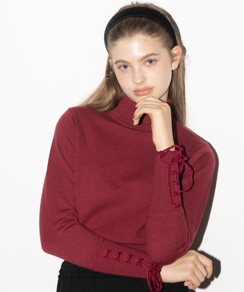 レースアップタートルニット idem（イデム）の「lace up ribbon turtle knit/袖口レースアップ