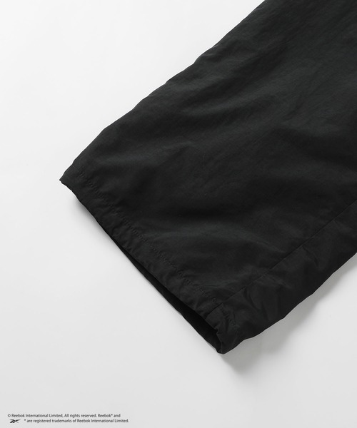 Reebok(リーボック)の「【Reebok/MSG別注】ジップデザインドローコードナイロンパンツ(その他パンツ・メンズ・ブラック/グレー・XL/L/M/S)」の3枚目の写真