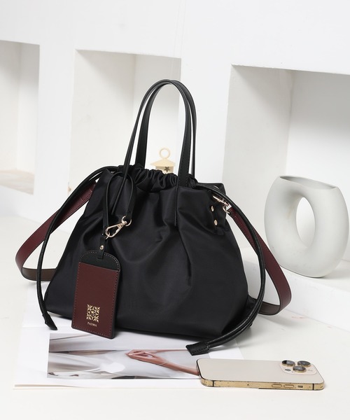 PADMA(パドマ)の「【PADMA/パドマ】ナイロン×レザー 巾着ミニトートバッグ(ビジネスバッグ・レディース・グレー/カーキ/ピンク/ワイン/ベージュ/ブラック/ネイビー・FREE)」の2枚目の写真