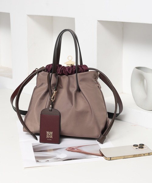 PADMA(パドマ)の「【PADMA/パドマ】ナイロン×レザー 巾着ミニトートバッグ(ビジネスバッグ・レディース・グレー/カーキ/ピンク/ワイン/ベージュ/ブラック/ネイビー・FREE)」の8枚目の写真