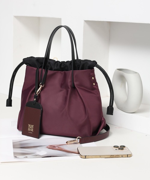 PADMA(パドマ)の「【PADMA/パドマ】ナイロン×レザー 巾着ミニトートバッグ(ビジネスバッグ・レディース・グレー/カーキ/ピンク/ワイン/ベージュ/ブラック/ネイビー・FREE)」の9枚目の写真