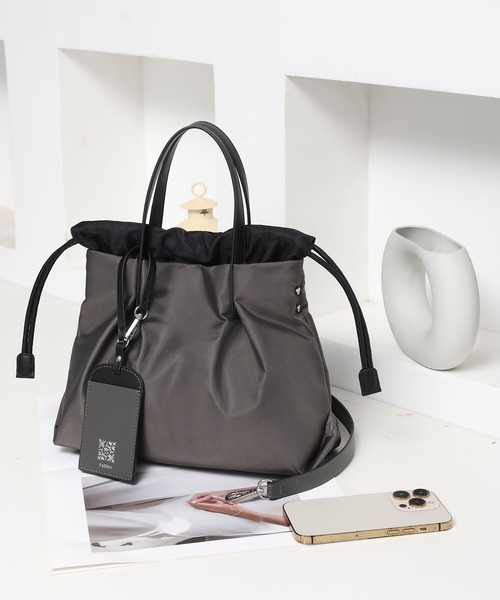 PADMA(パドマ)の「【PADMA/パドマ】ナイロン×レザー 巾着ミニトートバッグ(ビジネスバッグ・レディース・グレー/カーキ/ピンク/ワイン/ベージュ/ブラック/ネイビー・FREE)」の10枚目の写真