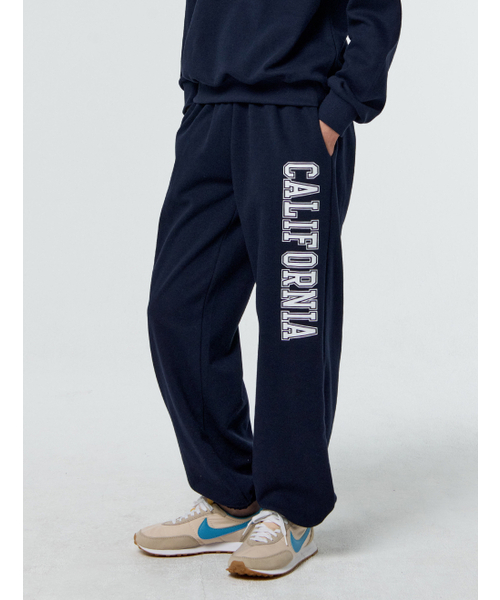PAPERBOY(ペーパーボーイ)の「カリフォルニアワイドジョガーパンツ-ネイビー(スウェットパンツ・レディース・その他・SMALL/MEDIUM/LARGE)」の1枚目の写真