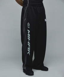 MIHAK（ミハク）の「スポンサー ロゴ メッシュジャージ ワイドパンツ (ブラック)（スウェットパンツ）」