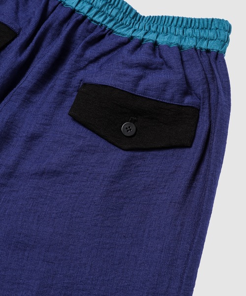WhoWhat(フーワット)の「DOMINANT COLOR PANTS(その他パンツ・メンズ・オレンジ/ネイビー・M)」の5枚目の写真