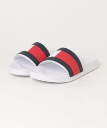 TOMMY HILFIGER（トミーヒルフィガー）の「ヒルフィガーフラッグプールスライドサンダル（サンダル）」