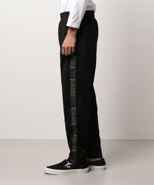GOLDEN GOOSE（ゴールデングース）の「GOLDEN GOOSE Track pants Game EDT Capsule Collection in black with logoed side line（その他パンツ・メンズ・ブラック系その他・X-SMALL/SMALL/MEDIUM/LARGE）」の4枚目の写真
