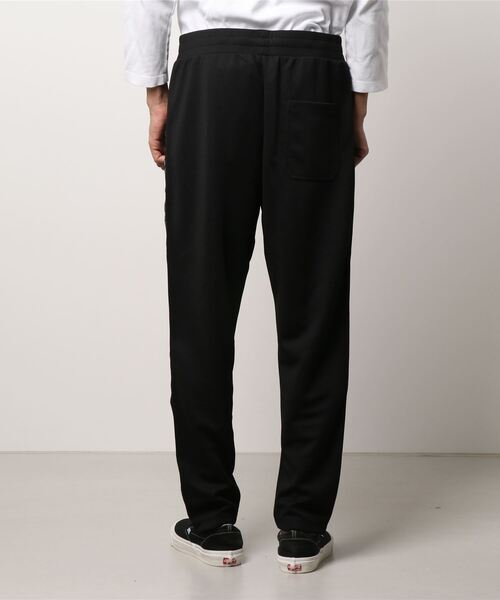 GOLDEN GOOSE（ゴールデングース）の「GOLDEN GOOSE Track pants Game EDT Capsule Collection in black with logoed side line（その他パンツ・メンズ・ブラック系その他・X-SMALL/SMALL/MEDIUM/LARGE）」の3枚目の写真