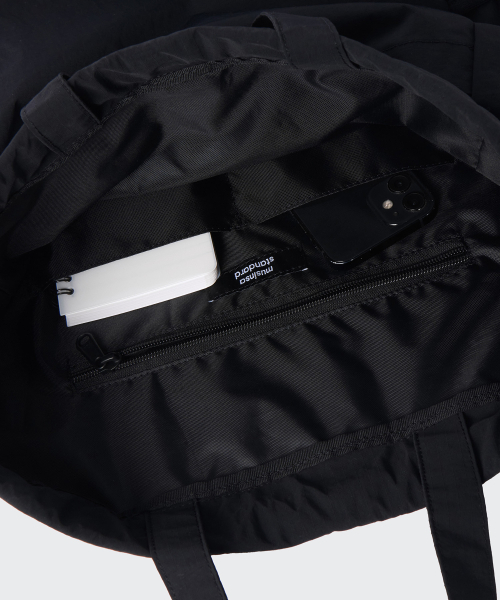 MUSINSA STANDARD（ムシンサスタンダード）の「リップストップワンバックルドローストリングバックパック[ブラック]（バックパック/リュック・レディース・その他・FREE）」の6枚目の写真