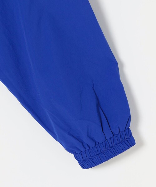 le coq sportif(ルコックスポルティフ)の「le coq sportif:〈撥水加工/洗濯機可能〉ナイロン ウィンドブレーカー ジャケット(ナイロンジャケット・レディース・ネイビー/ブルー・ONE SIZE)」の7枚目の写真