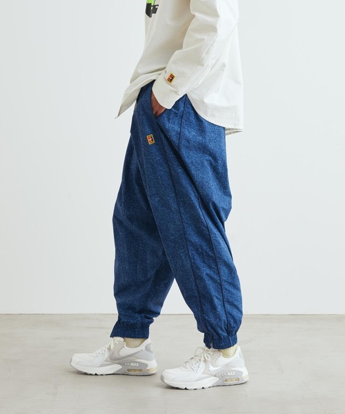 NIKE(ナイキ)の「《セットアップ対応商品》ナイキ クラブ ルールズ メンズ トラックパンツ / Nike Club Rules Men's Track Pants IQ8431-486 Work Blue(その他パンツ・メンズ・ブルー系その他・M/L/2XL/XL/S)」の2枚目の写真