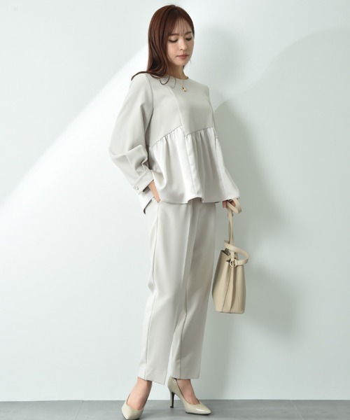 INTERPLANET(インタープラネット)の「TRダブルクロス異素材切替ペプラムブラウス(シャツ/ブラウス・レディース・ネイビー/グレイッシュベージュ・FREE)」の4枚目の写真