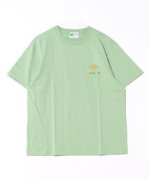 ALMOND（アーモンド）の「OFF SHORE ALMOND PELICAN TEE / アーモンドペリカンバッグプリント半袖T-シャツ（Tシャツ/カットソー）」