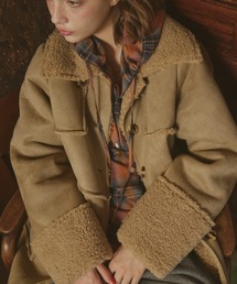 Unitage(ユニテージ)のムートンミドルコート(ムートンコート)