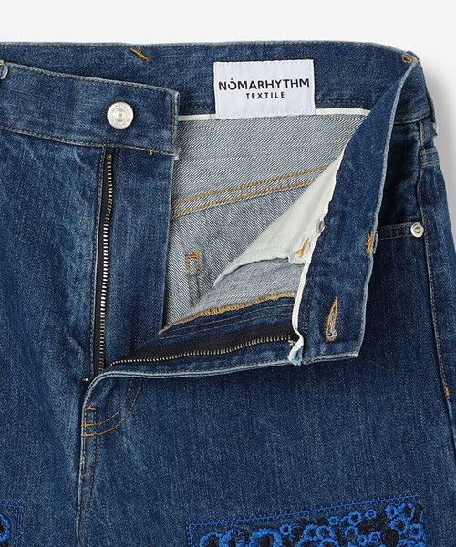 NOMA t.d.(ノーマティーディー)の「NOMARHYTHM TEXTILE | バンダナ刺繍 デニムパンツ WOMEN(デニムパンツ・レディース・インディゴブルー・1)」の6枚目の写真