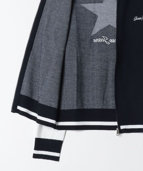 GUESS JEANS(ゲスジーンズ)の「GUESS JEANS Star Bomber Sweat スタジャン アウター ジャケット(スタジャン・メンズ・ネイビー・LARGE/MEDIUM/SMALL/XX-LARGE/X-LARGE)」の7枚目の写真