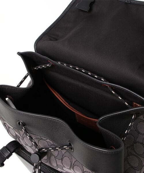 COACH（コーチ）の「リーグ フラップ バックパック・シグネチャー ジャ