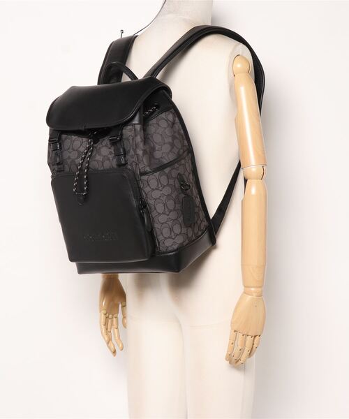 COACH（コーチ）の「リーグ フラップ バックパック・シグネチャー ジャ