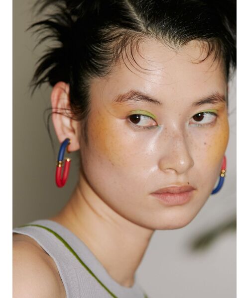UN3D 2トーンカーブピアス　ライム UN3D.（アンスリード）の「2 TONE CURVE EARRING / 2トーン