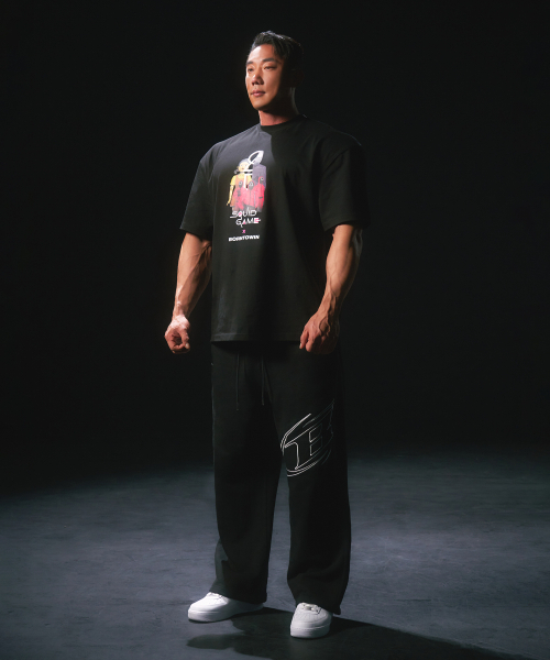 BORN TO WIN（ボーントゥウィン）の「SQUID GAME CHARACTER T-SHIRTS [BLACK]（Tシャツ/カットソー・メンズ・その他・1/2/3）」の3枚目の写真