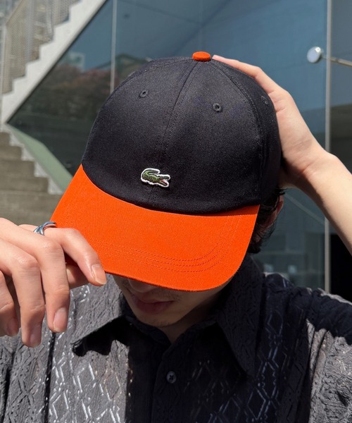 LACOSTE(ラコステ)の「【LACOSTE】バイカラーワンポイントキャップ L1272 CBS(キャップ・メンズ・ネイビー/ホワイト/ブラック・FREE)」の1枚目の写真