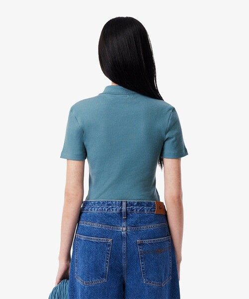 タイトフィットリブニットポロシャツ （ホワイト） LACOSTE（ラコステ）の「タイトフィットリブニットポロシャツ