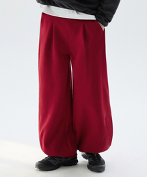 TRILLION（トリリオン）の「Deep Tuck Balloon Fit Sweat Jogger Pants_RED（スウェットパンツ・メンズ）」