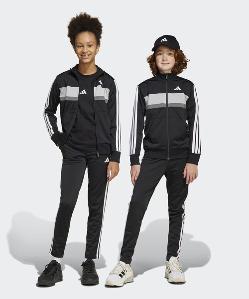adidas(アディダス)の「シーズナル エッセンシャルズ Tiberio スリーストライプス トリコット トラックスーツ キッズ / ジャージ / アディダス adidas(ジャージ・キッズ・ブラック×グレー/ブラック×レッド/ブルー・130/140/150/160)」の2枚目の写真