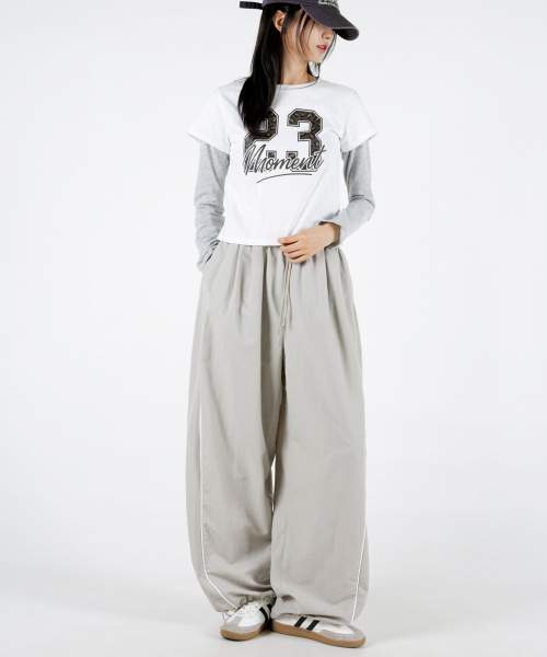 UMM（ウム）の「レディースサイドラインバルーンワイドトラックパンツ3COLOR（スウェットパンツ・レディース・ブラック/ライトベージュ/チャコール・1/2）」の9枚目の写真
