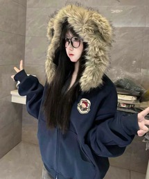 CELENA BEATS（セレナビーツ）の「フェイクファー 耳風フード カレッジ ロゴ ジップ パーカー（パーカー・レディース）」